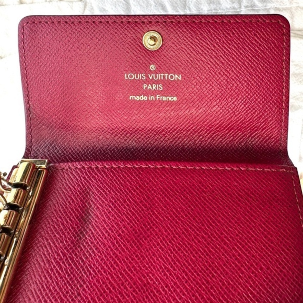 AUTHENTIC Louis Vuitton key holder. Monogram pattern. Magenta interior. - Picture 10 of 15